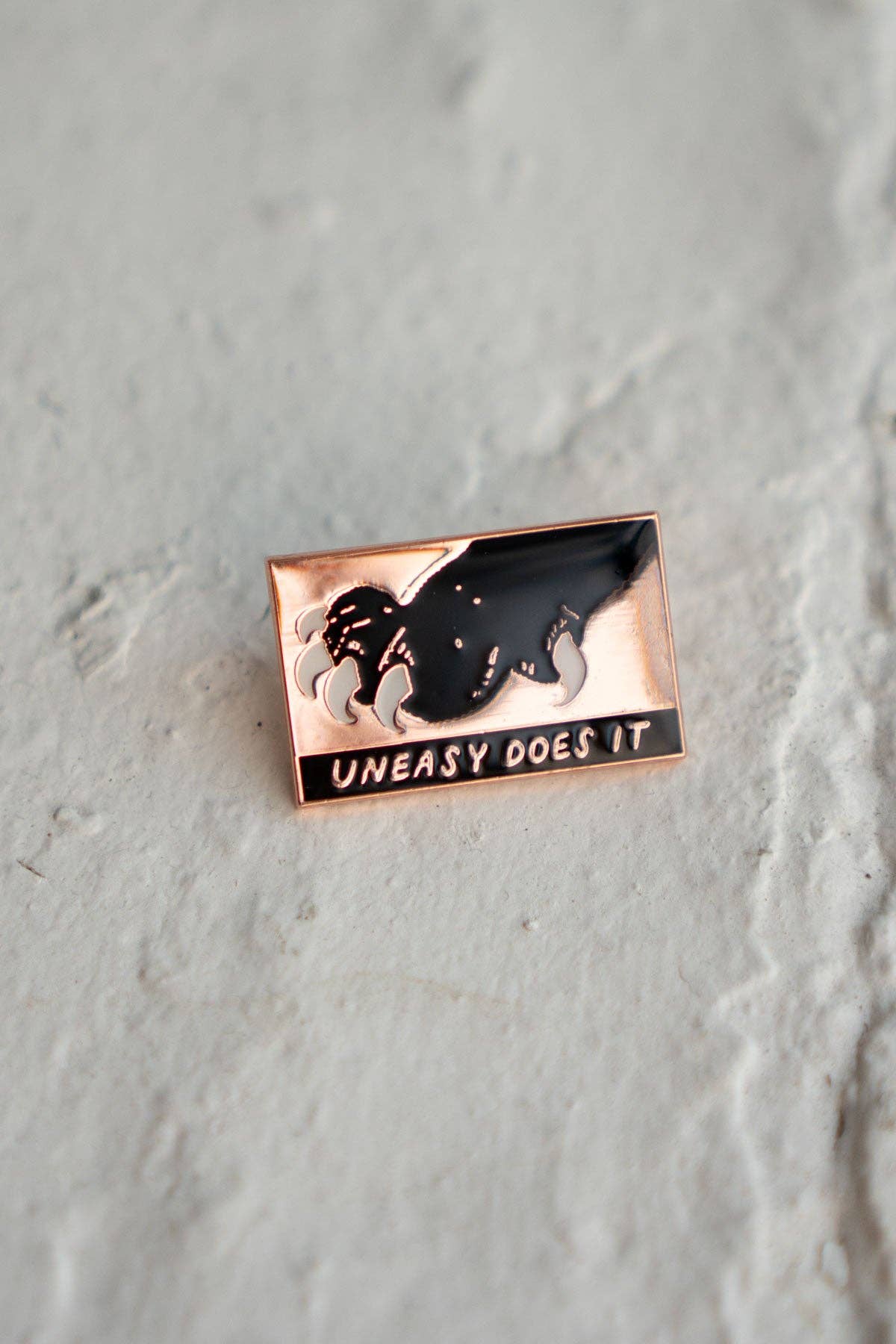 Uneasy Does It Lapel Pin